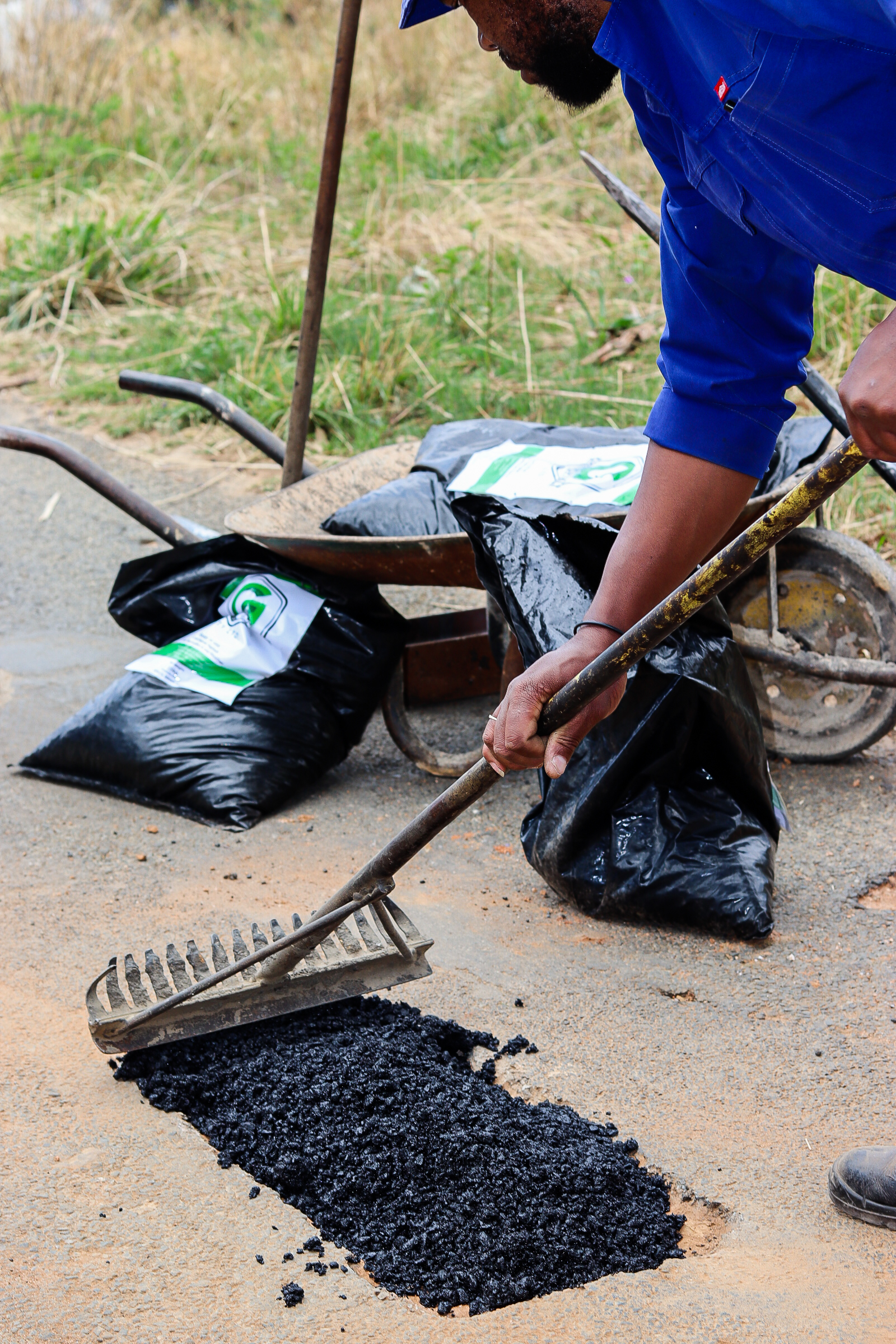 Green Asphalt Pothole Repair