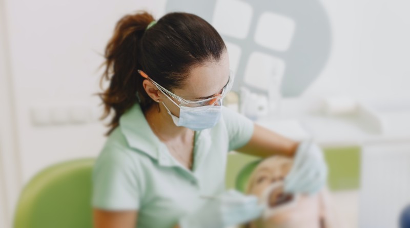 Orthodontist with patient
