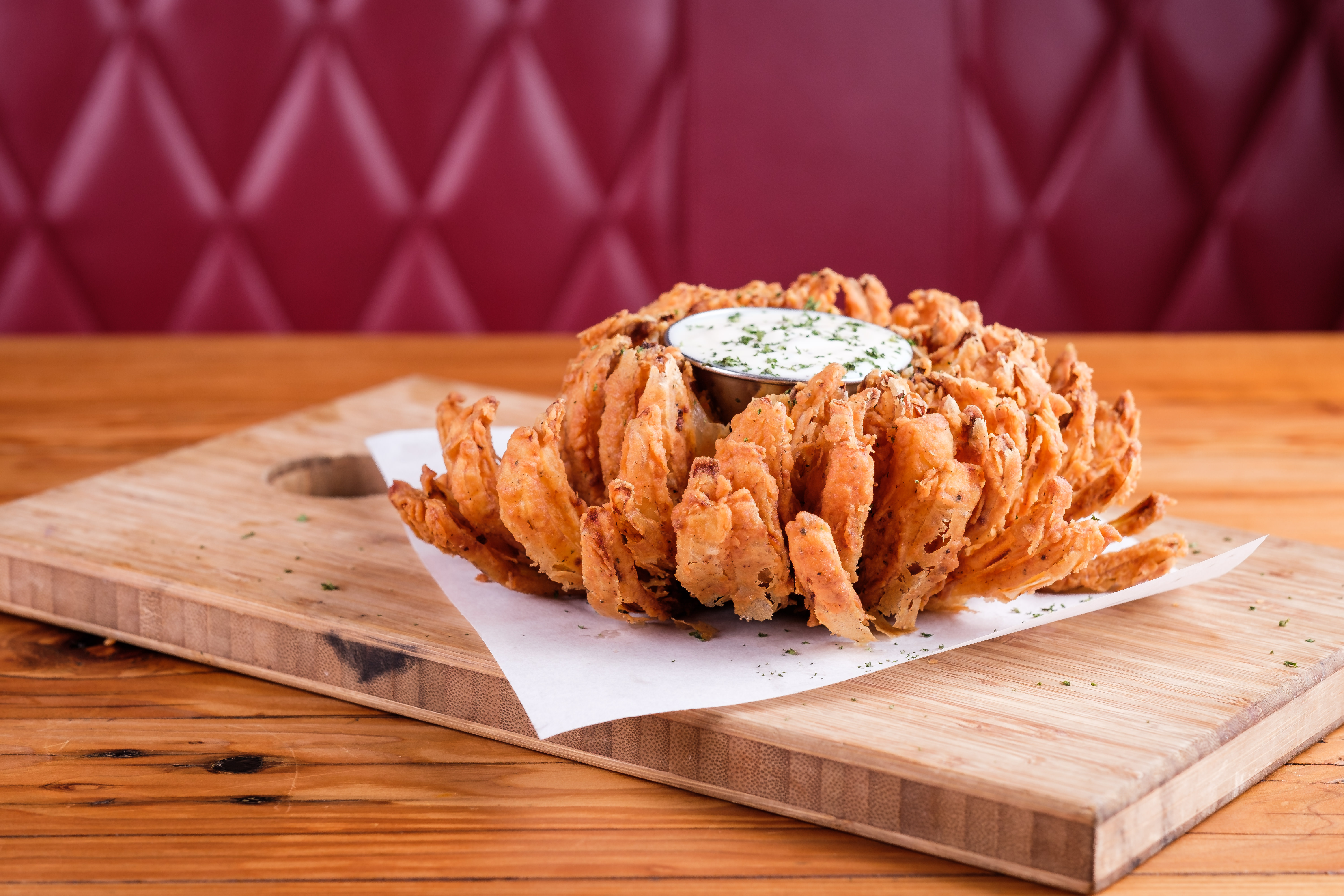 Bloomin Onion ~ Our speciality onion is cut to resemble a flower, battered and deep-fried. Served with our spicy Ponta Mayo.