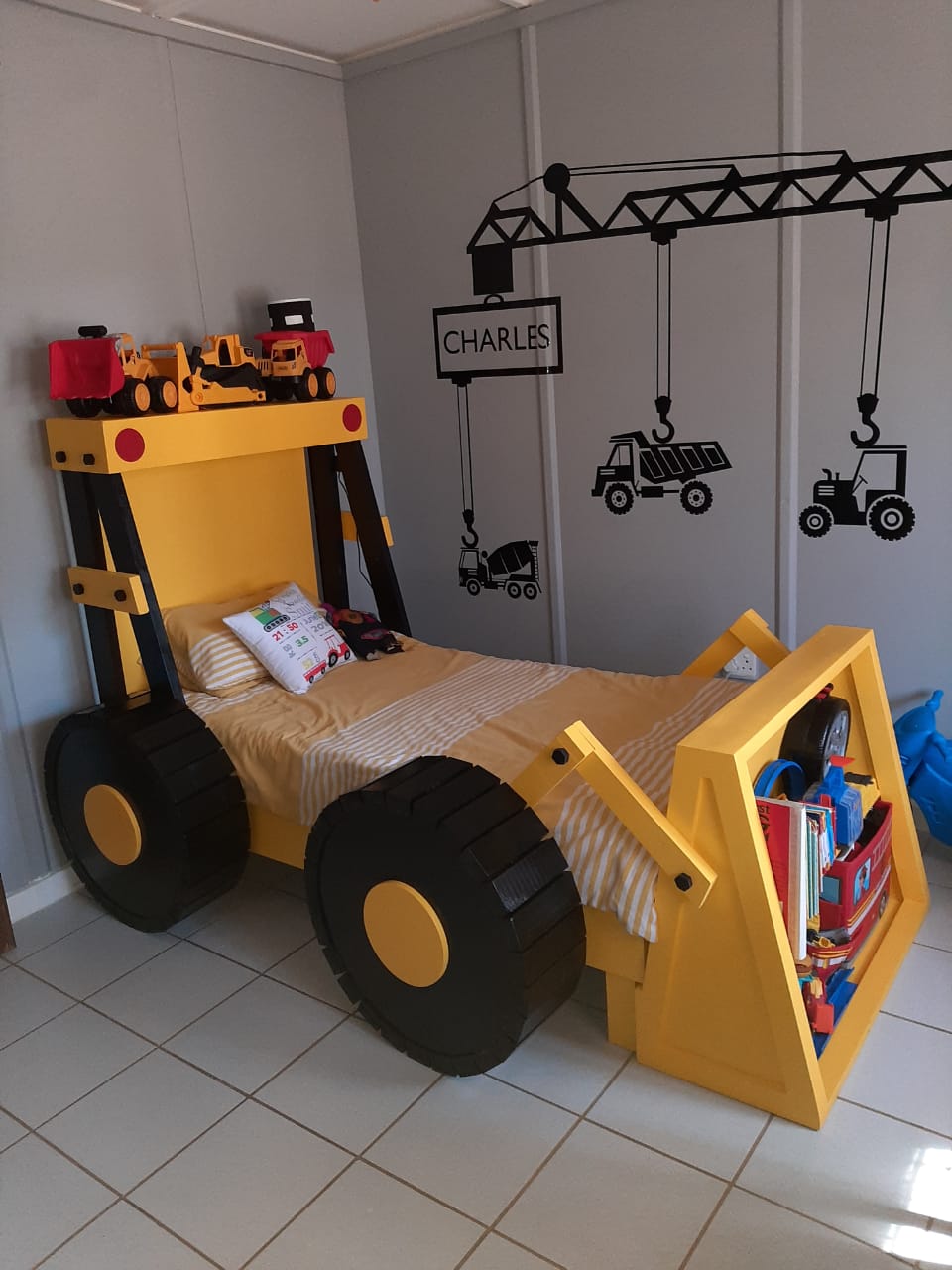Yellow digger kids charater bed with built in shelf 