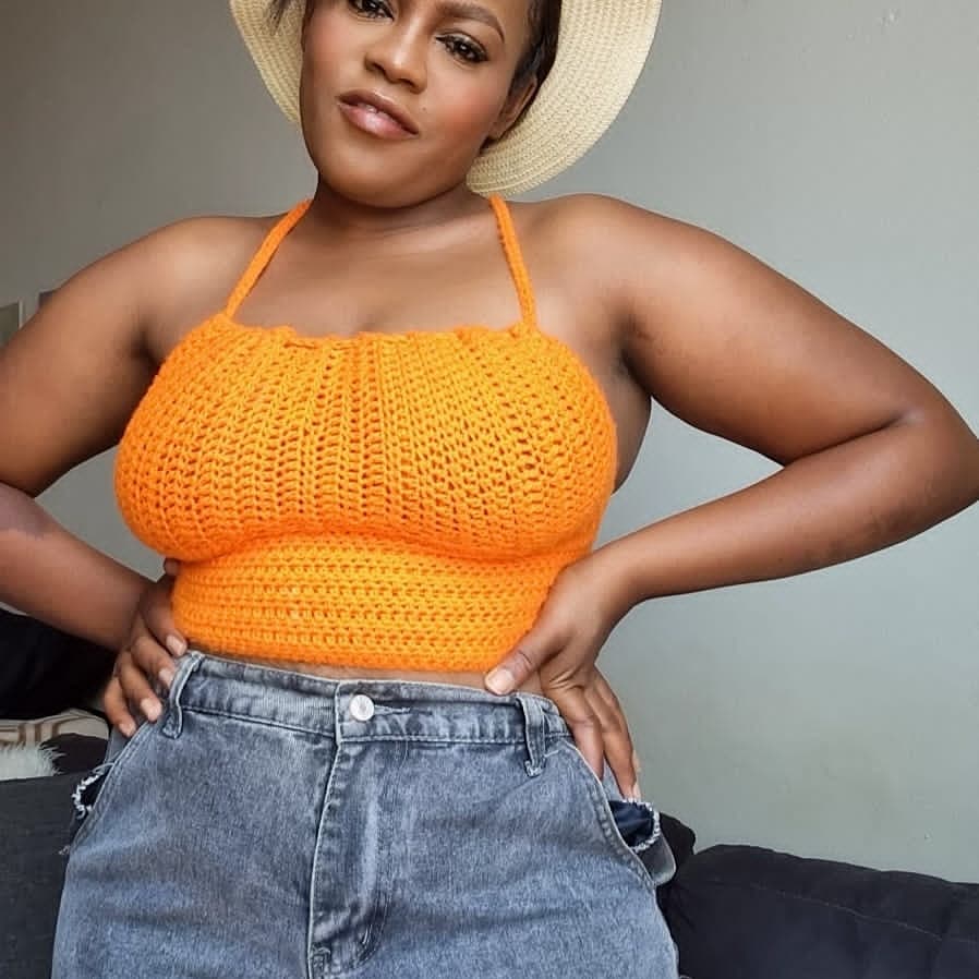Orange knitted top by scrunch house