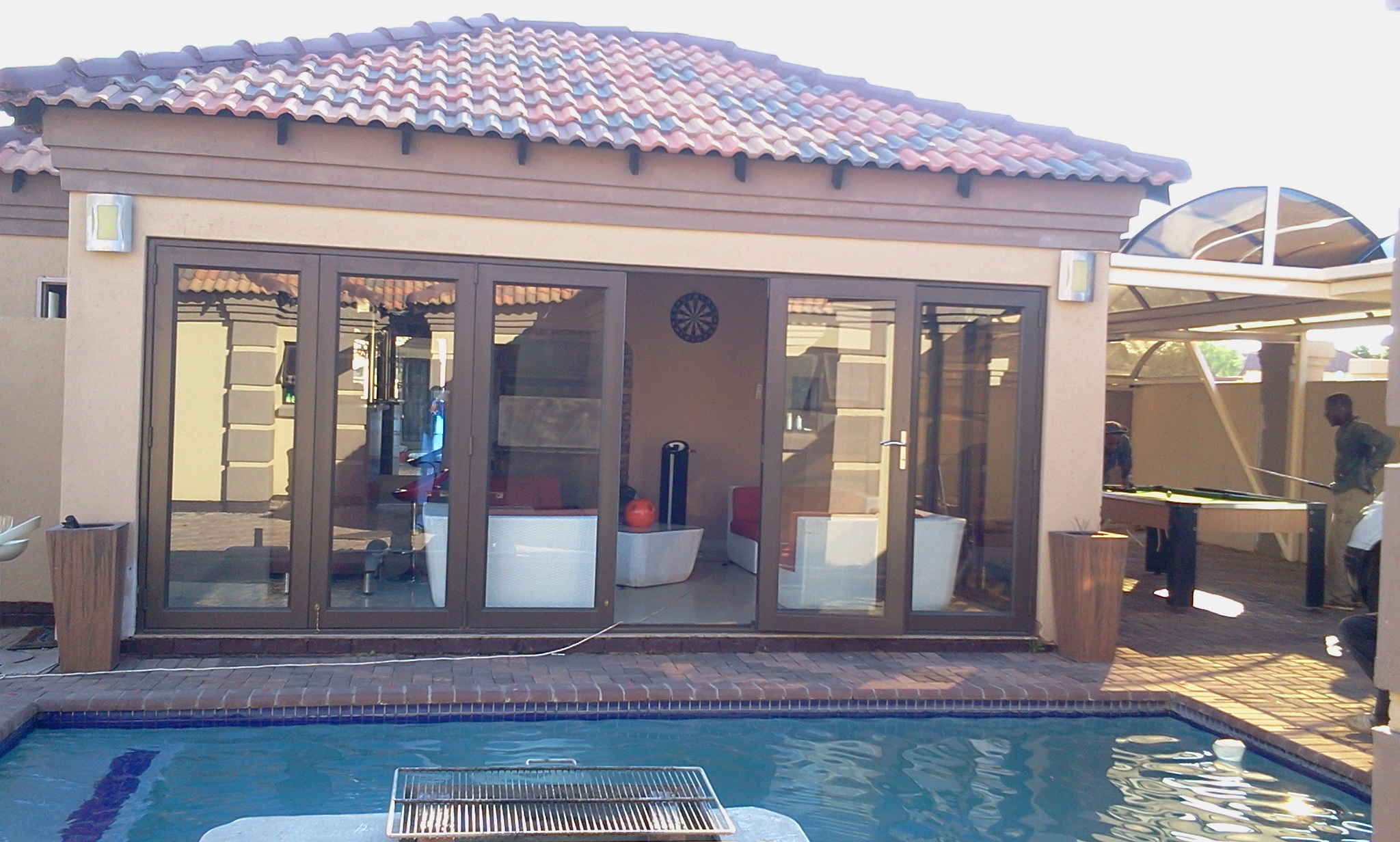 Bronze 6 panel flolding door glazed with 6.38 cool bronze safty glass