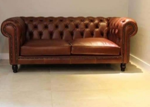 Chesterfield 2 seater.Genuine leather.can get in black,brown,ran,red and grey